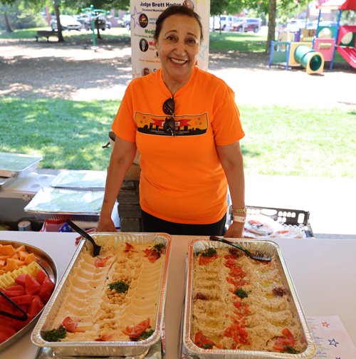 Serving hummus and baba ganoush