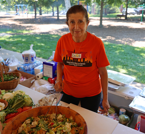 Mireille Abdulkarim serving tabouli salad