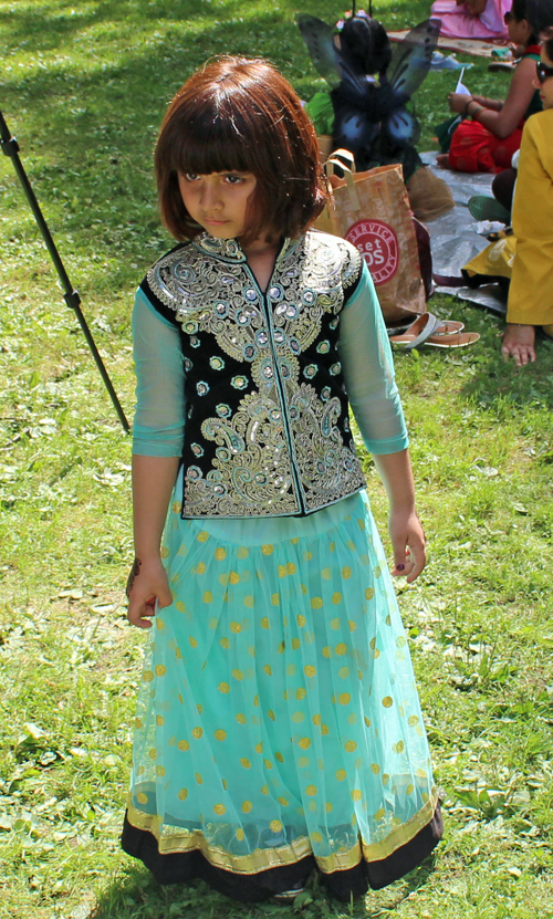 Little girl in Pakistani Garden on One World Day