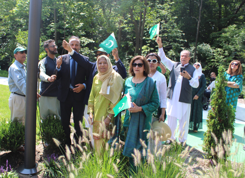 Ceremonial raising of the flag of Pakistan in the Pakistani Cultural Garden 