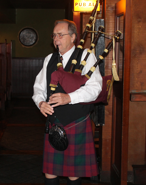 Bruce Grieg on bagpipes