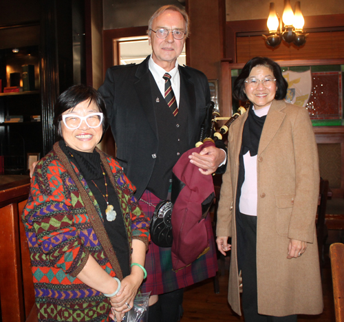 Pipe Major Bruce Grieg with Margaret and Cecilia Wong