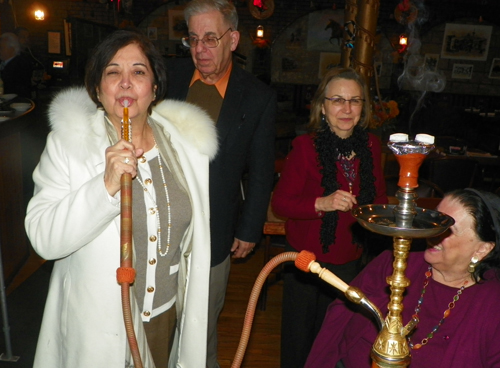 Mona Alag smoking a hookah