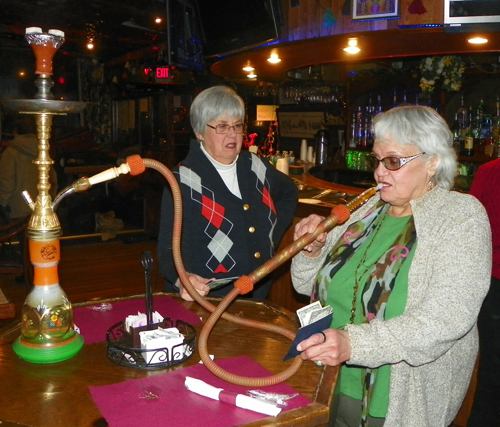 Kathleen Debernardi smoking a hookah