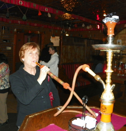 Maureen Pucell smoking a hookah