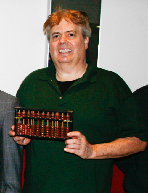 Dan Hanson with Chinese abacus