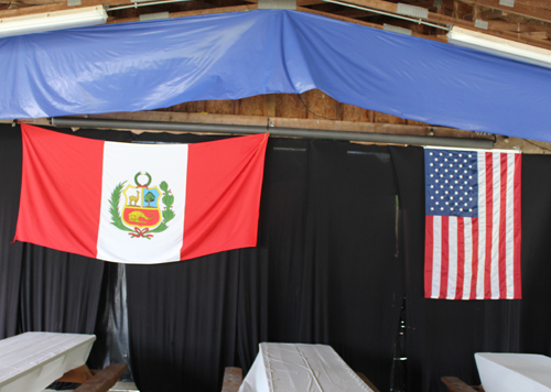 Flags of Peru and USA at picnic