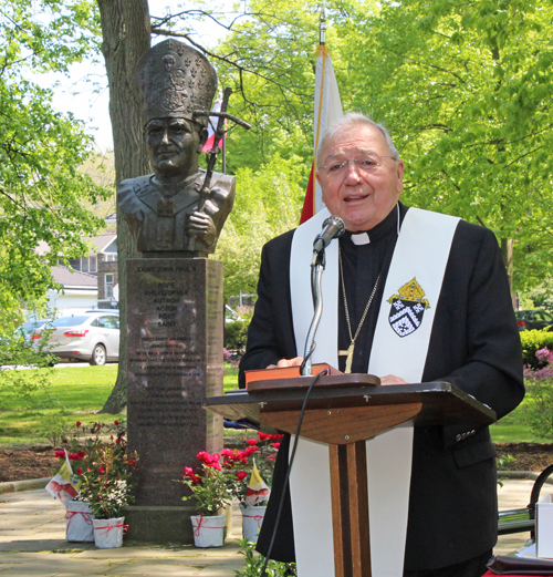 Bishop Roger Gries blesses the bust of Saint John Paul II