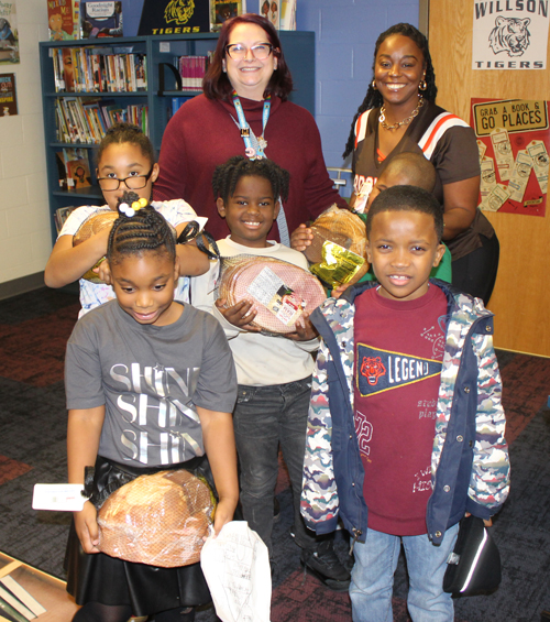 Teachers and kids with hams at Willson School