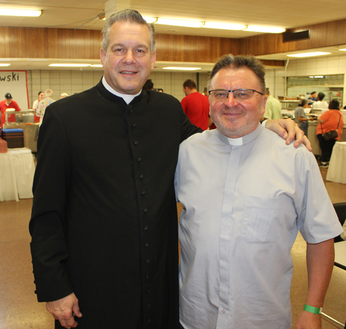 Father Eric Orzech and Father Mike