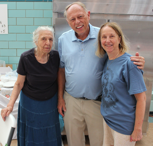 Longtime parishoner Cat with John and April Niedzialek