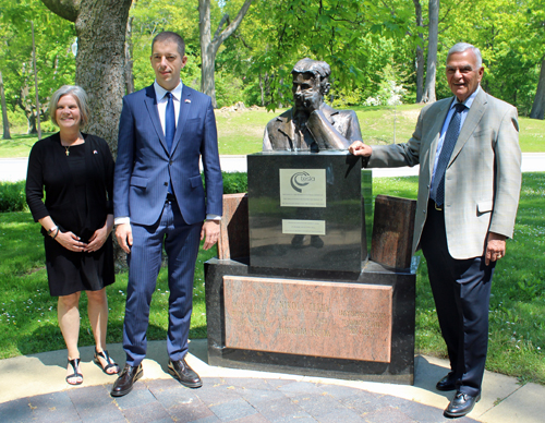 Mayor Georgine Welo, Ambassador Marko Djuric and Alex Machaskee with the bust of Nikola Tesla