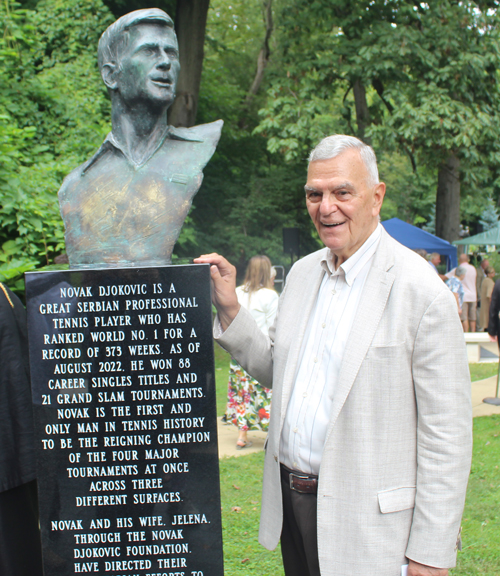 Alex Machaskee with bust of Novak Djokovic