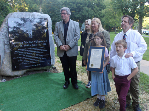 Voinovich family members with proclamation