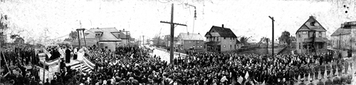 A crowd of about 2000 filled Aetna Road and surrounding properties to celebrate the laying of the cornerstone of Nativity BVM School, November 14, 1915.