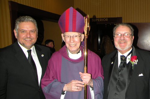 Joe Valencic, Polka Hall of Fame President, and Mark Habat, Vice President, with Bishop Edward Pevec after the Polka Mass at the Thanksgiving Polka Party Weekend.