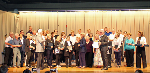 Slovenia's Ambassador to the United States, Iztok Miroic and President Nataa Pirc Musar joined the choir after the song for a few impromptu Slovenian songs.