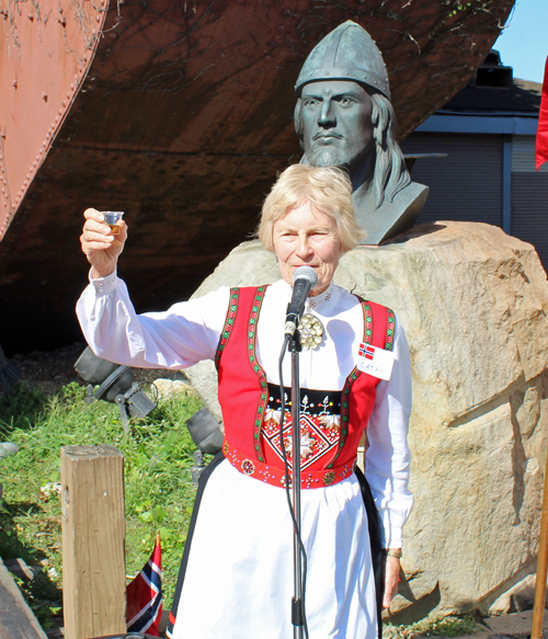 Catherine Jorgensen McCutcheon modeled a tradional Norwegian costume or bunad as she led the toast