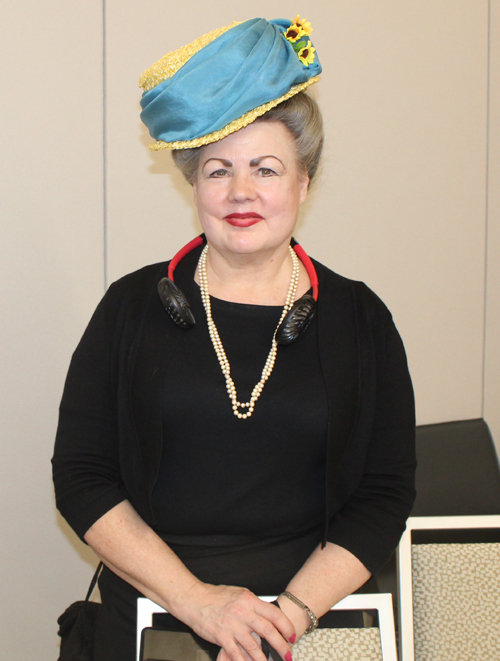Lady with Ukrainian colors hat