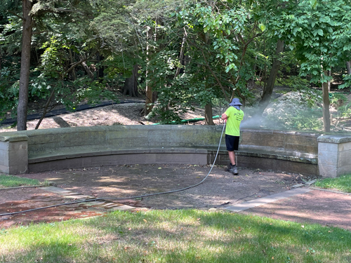 Power washing the Ukrainian Cultural Garden