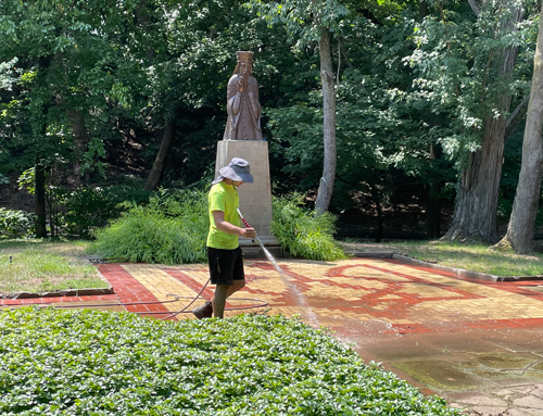 Power washing the Ukrainian Cultural Garden