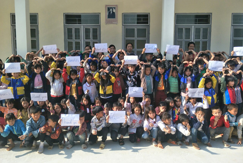 Vietname kids thanking Friendship Foundation for new school