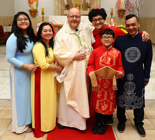 Bishop Malesic at St Boniface Church with family