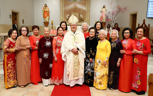 Bishop Malesic at St Boniface Church with women