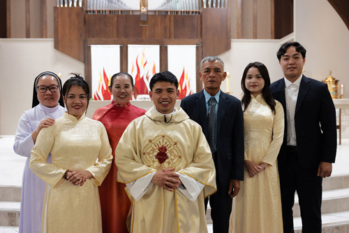 Father Ho and extended family